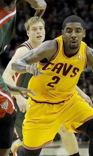 Irving scores 39, Cavs beat Bucks 114-111 in OT